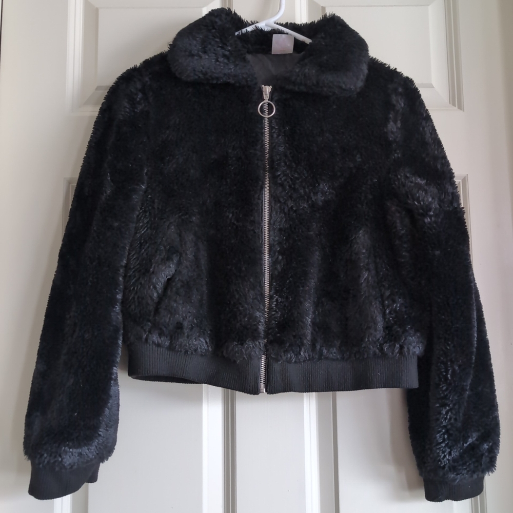 Black faux fur bomber jacket with silver O ring zipper and collar